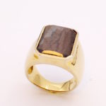 gold sheen sapphire mens ring with copper and bronze tones