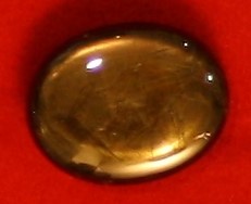Gold Sheen Sapphire Collectors Piece 45.4 Carat Cabochon with Asterism