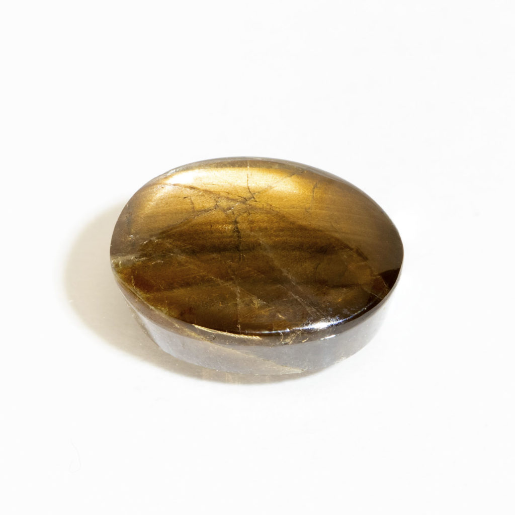 Gold sheen sapphire some reflection, with schiller visible
